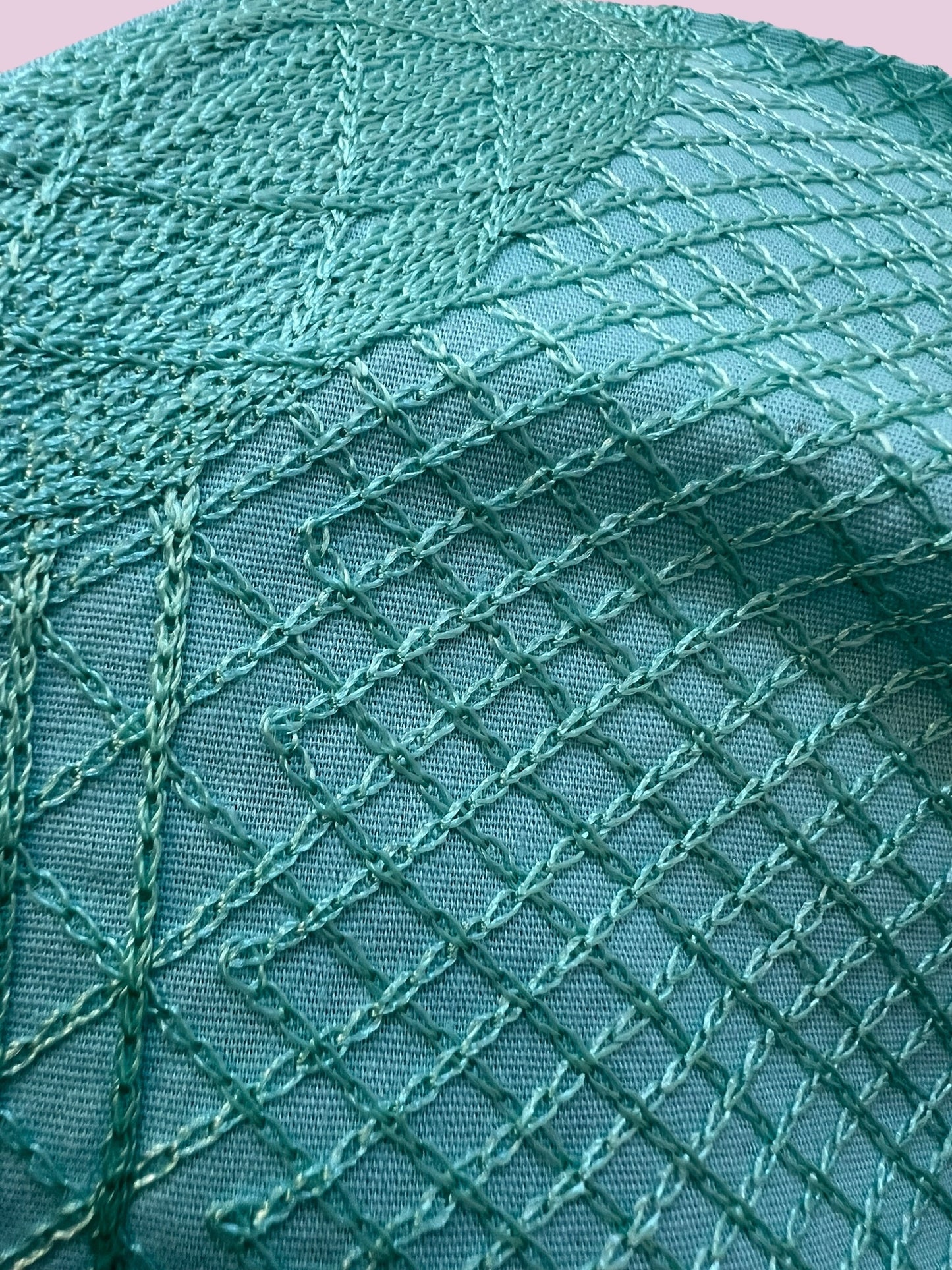 Blusa artesanal de cadenilla fina con manga larga turquesa